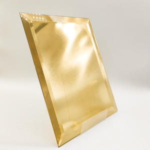 زجاج عاكس مطلي بالذهب